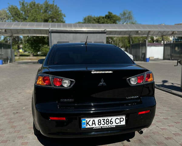 Чорний Міцубісі Lancer, об'ємом двигуна 2 л та пробігом 213 тис. км за 8200 $, фото 3 на Automoto.ua