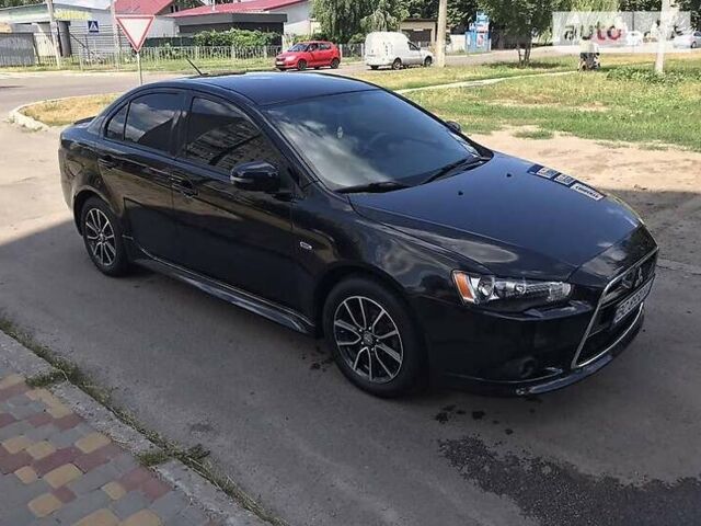 Чорний Міцубісі Lancer, об'ємом двигуна 2.36 л та пробігом 169 тис. км за 9000 $, фото 4 на Automoto.ua