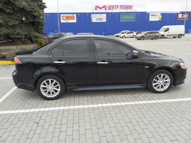 Чорний Міцубісі Lancer, об'ємом двигуна 2 л та пробігом 155 тис. км за 9250 $, фото 6 на Automoto.ua