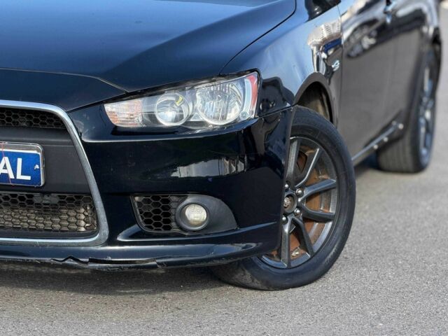 Черный Мицубиси Лансер, объемом двигателя 2.4 л и пробегом 160 тыс. км за 6700 $, фото 23 на Automoto.ua