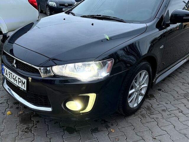 Черный Мицубиси Лансер, объемом двигателя 2.4 л и пробегом 118 тыс. км за 10200 $, фото 2 на Automoto.ua