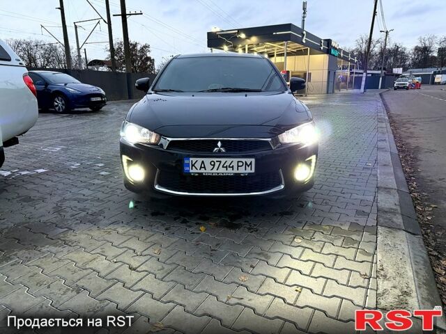 Черный Мицубиси Лансер, объемом двигателя 2.4 л и пробегом 118 тыс. км за 10200 $, фото 3 на Automoto.ua