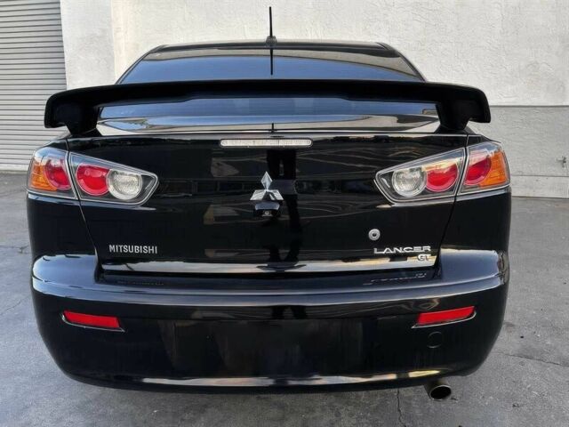Черный Мицубиси Лансер, объемом двигателя 2.4 л и пробегом 76 тыс. км за 9200 $, фото 5 на Automoto.ua