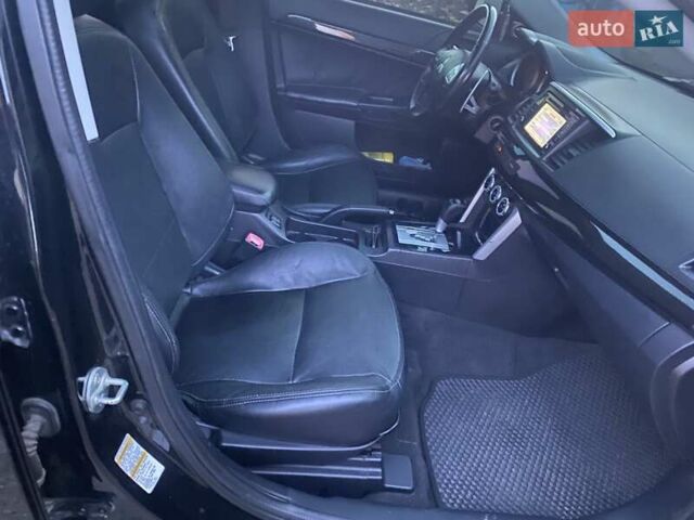 Черный Мицубиси Лансер, объемом двигателя 2.36 л и пробегом 178 тыс. км за 9300 $, фото 8 на Automoto.ua