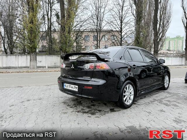 Черный Мицубиси Лансер, объемом двигателя 2.4 л и пробегом 118 тыс. км за 10200 $, фото 6 на Automoto.ua
