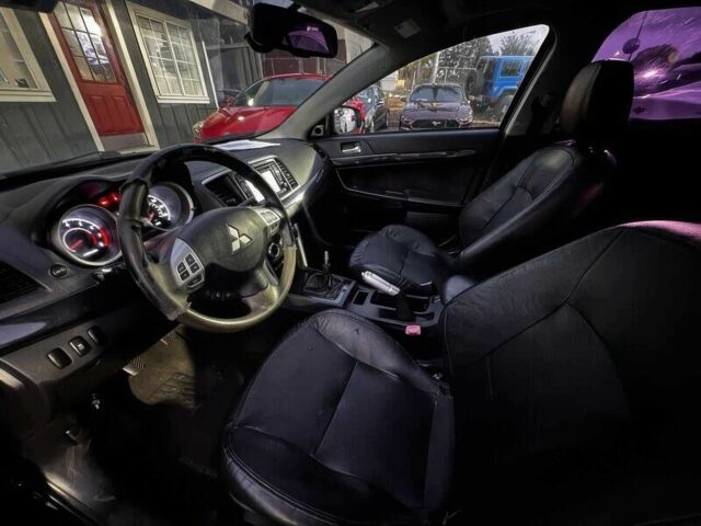 Черный Мицубиси Лансер, объемом двигателя 2.4 л и пробегом 76 тыс. км за 9200 $, фото 8 на Automoto.ua