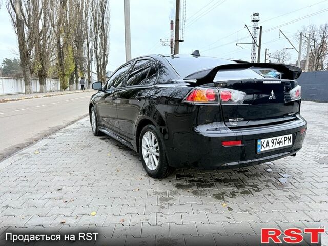 Черный Мицубиси Лансер, объемом двигателя 2.4 л и пробегом 118 тыс. км за 10200 $, фото 7 на Automoto.ua