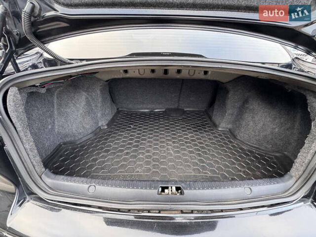 Черный Мицубиси Лансер, объемом двигателя 2 л и пробегом 156 тыс. км за 8999 $, фото 11 на Automoto.ua