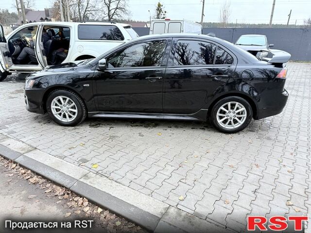 Черный Мицубиси Лансер, объемом двигателя 2.4 л и пробегом 118 тыс. км за 10200 $, фото 8 на Automoto.ua