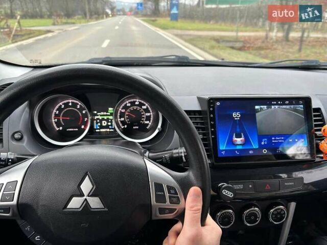 Чорний Міцубісі Lancer, об'ємом двигуна 2.36 л та пробігом 98 тис. км за 9250 $, фото 15 на Automoto.ua