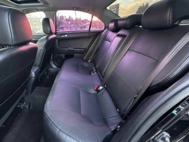 Черный Мицубиси Лансер, объемом двигателя 2.4 л и пробегом 76 тыс. км за 9200 $, фото 9 на Automoto.ua