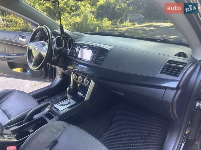 Черный Мицубиси Лансер, объемом двигателя 2.36 л и пробегом 178 тыс. км за 9300 $, фото 13 на Automoto.ua