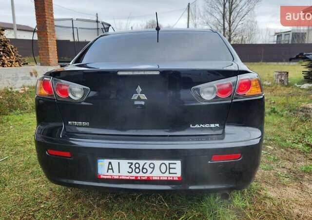 Чорний Міцубісі Lancer, об'ємом двигуна 2 л та пробігом 127 тис. км за 9600 $, фото 6 на Automoto.ua