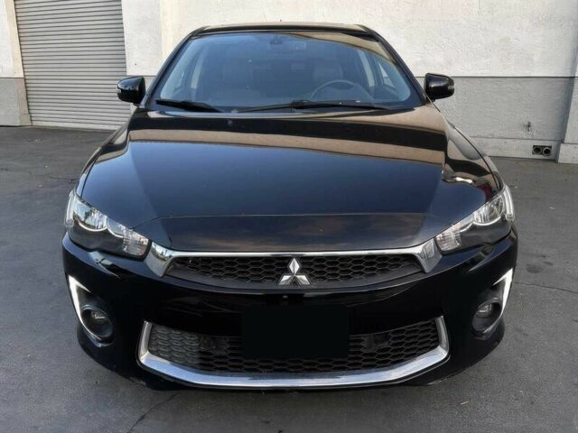 Черный Мицубиси Лансер, объемом двигателя 2.4 л и пробегом 76 тыс. км за 9200 $, фото 1 на Automoto.ua