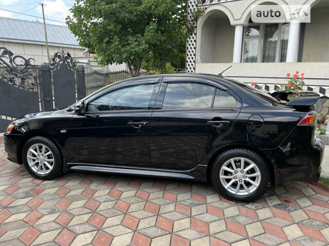 Чорний Міцубісі Lancer, об'ємом двигуна 2.4 л та пробігом 120 тис. км за 9900 $, фото 13 на Automoto.ua