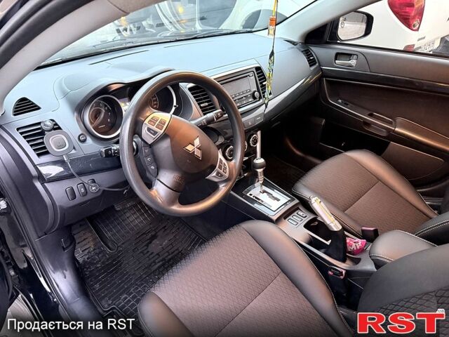 Черный Мицубиси Лансер, объемом двигателя 2.4 л и пробегом 118 тыс. км за 10200 $, фото 10 на Automoto.ua