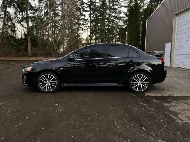 Черный Мицубиси Лансер, объемом двигателя 2.4 л и пробегом 73 тыс. км за 6500 $, фото 3 на Automoto.ua