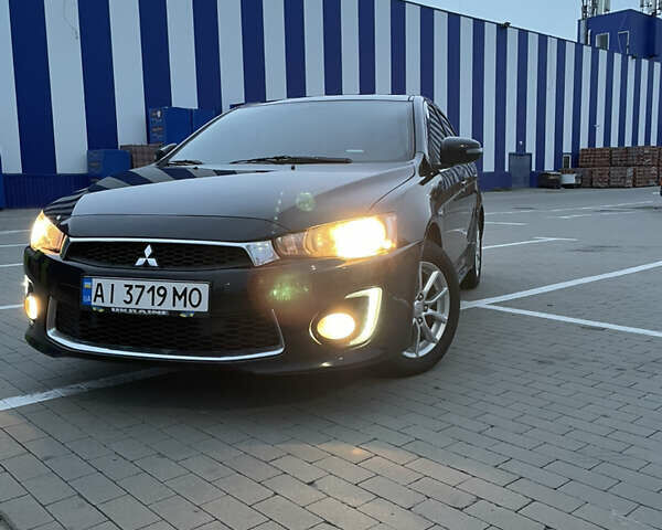 Чорний Міцубісі Lancer, об'ємом двигуна 2.36 л та пробігом 122 тис. км за 8200 $, фото 1 на Automoto.ua