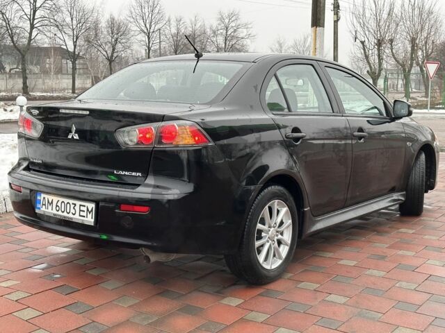 Чорний Міцубісі Lancer, об'ємом двигуна 2 л та пробігом 130 тис. км за 9500 $, фото 5 на Automoto.ua