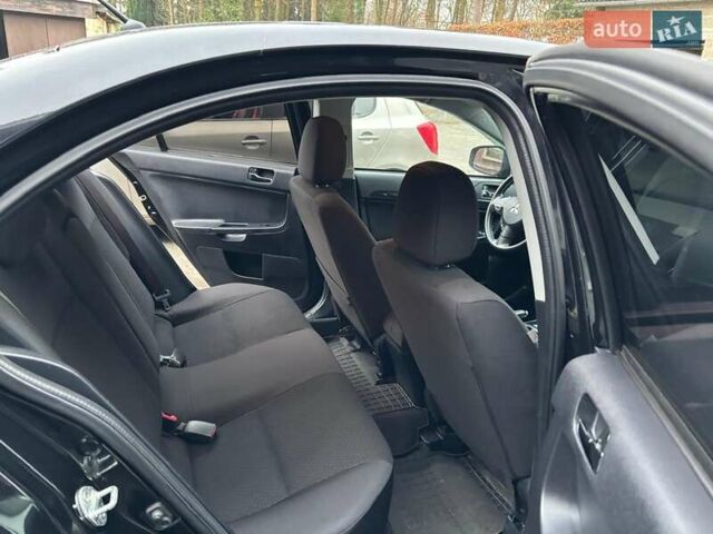 Чорний Міцубісі Lancer, об'ємом двигуна 2.36 л та пробігом 98 тис. км за 9250 $, фото 6 на Automoto.ua