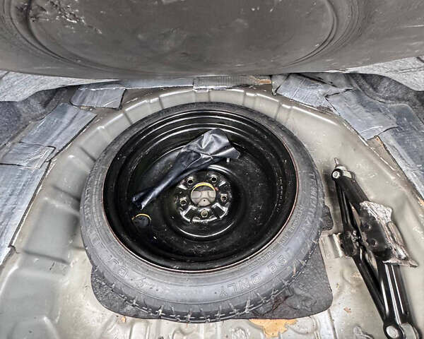 Черный Мицубиси Лансер, объемом двигателя 2 л и пробегом 156 тыс. км за 8999 $, фото 12 на Automoto.ua