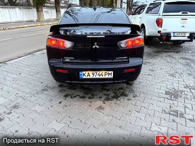 Черный Мицубиси Лансер, объемом двигателя 2.4 л и пробегом 118 тыс. км за 10200 $, фото 5 на Automoto.ua