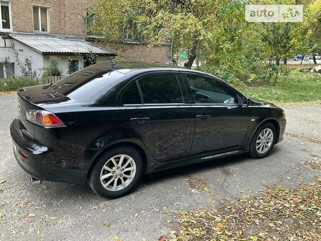 Чорний Міцубісі Lancer, об'ємом двигуна 2 л та пробігом 140 тис. км за 8200 $, фото 7 на Automoto.ua