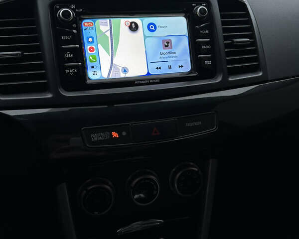 Черный Мицубиси Лансер, объемом двигателя 2 л и пробегом 142 тыс. км за 9500 $, фото 22 на Automoto.ua