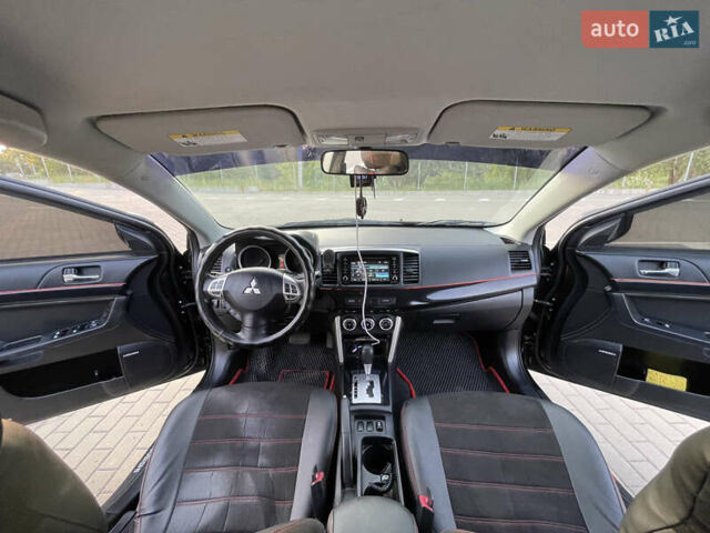 Черный Мицубиси Лансер, объемом двигателя 2.36 л и пробегом 136 тыс. км за 11600 $, фото 19 на Automoto.ua