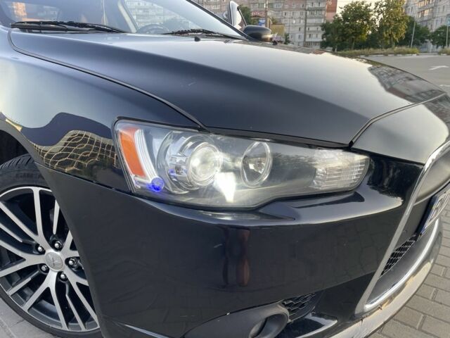 Черный Мицубиси Лансер, объемом двигателя 2.4 л и пробегом 140 тыс. км за 10800 $, фото 9 на Automoto.ua