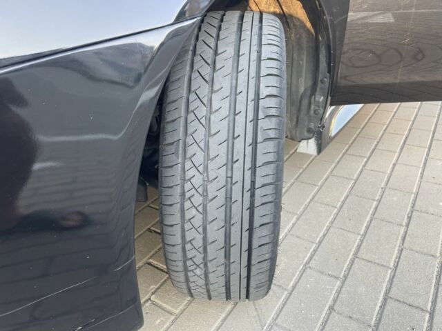 Черный Мицубиси Лансер, объемом двигателя 2.4 л и пробегом 140 тыс. км за 10800 $, фото 8 на Automoto.ua