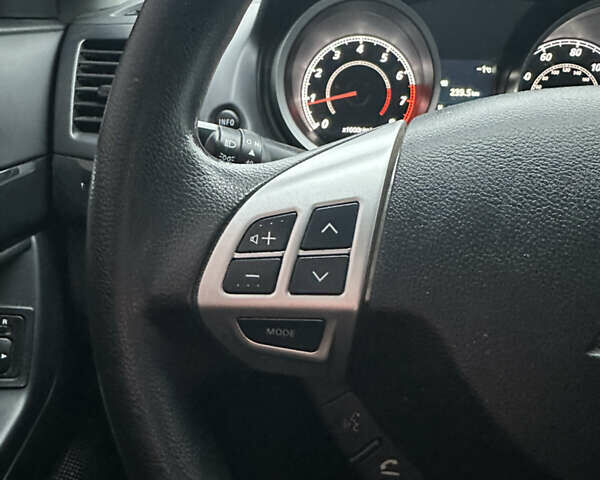 Черный Мицубиси Лансер, объемом двигателя 2 л и пробегом 142 тыс. км за 9500 $, фото 27 на Automoto.ua