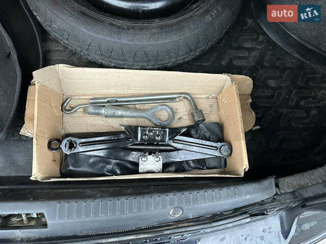 Черный Мицубиси Лансер, объемом двигателя 2 л и пробегом 142 тыс. км за 9500 $, фото 37 на Automoto.ua