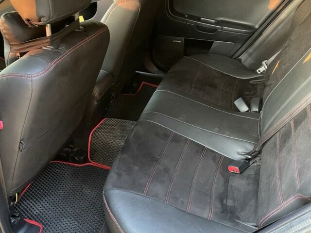 Черный Мицубиси Лансер, объемом двигателя 2.4 л и пробегом 140 тыс. км за 10800 $, фото 21 на Automoto.ua