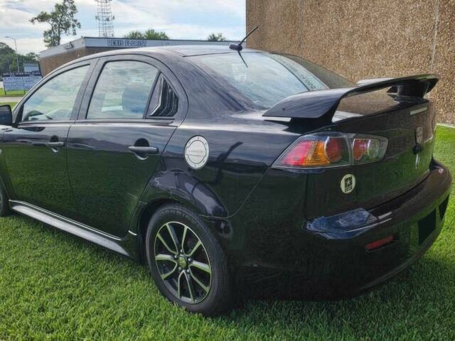 Чорний Міцубісі Lancer, об'ємом двигуна 2 л та пробігом 81 тис. км за 6000 $, фото 4 на Automoto.ua