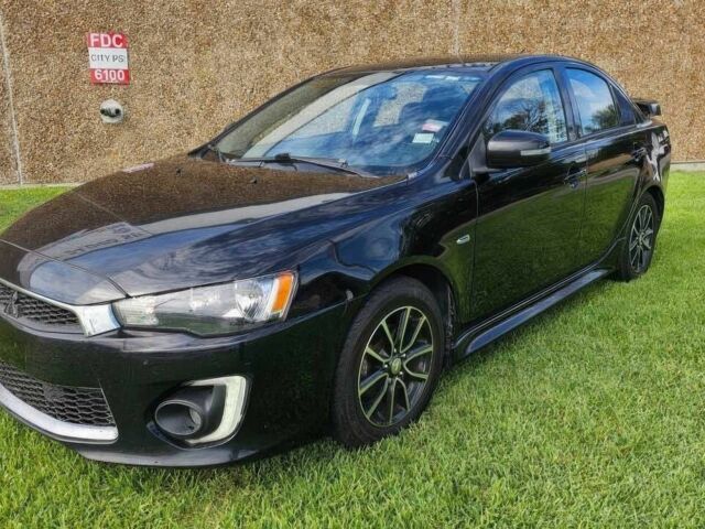 Чорний Міцубісі Lancer, об'ємом двигуна 2 л та пробігом 81 тис. км за 6000 $, фото 1 на Automoto.ua