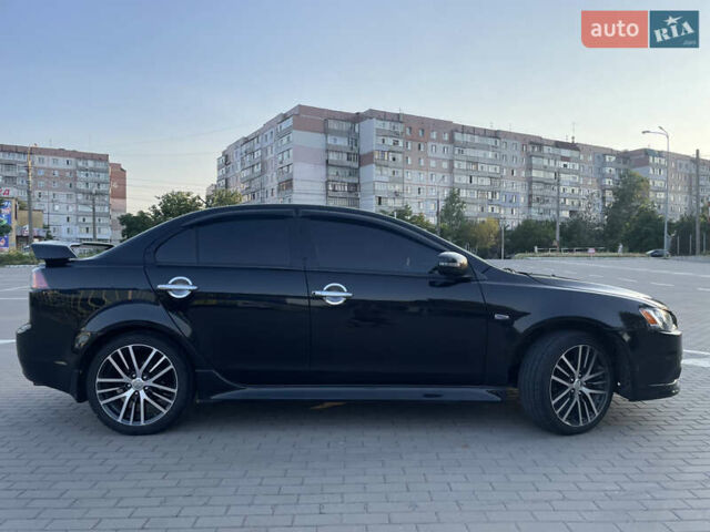 Черный Мицубиси Лансер, объемом двигателя 2.36 л и пробегом 136 тыс. км за 11600 $, фото 8 на Automoto.ua