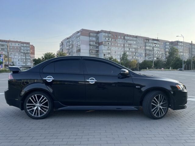 Черный Мицубиси Лансер, объемом двигателя 2.4 л и пробегом 140 тыс. км за 10800 $, фото 3 на Automoto.ua