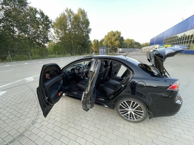 Черный Мицубиси Лансер, объемом двигателя 2.4 л и пробегом 140 тыс. км за 10800 $, фото 20 на Automoto.ua