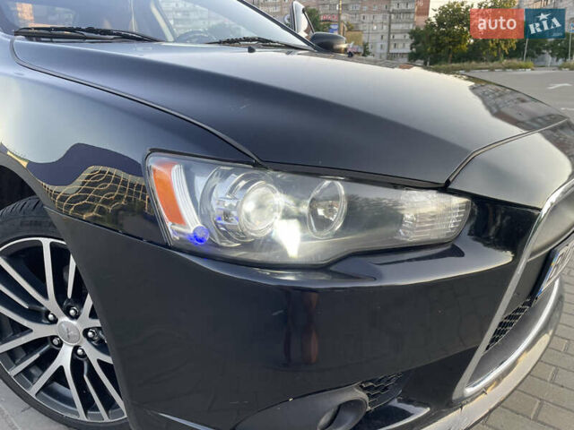 Черный Мицубиси Лансер, объемом двигателя 2.36 л и пробегом 136 тыс. км за 11600 $, фото 9 на Automoto.ua
