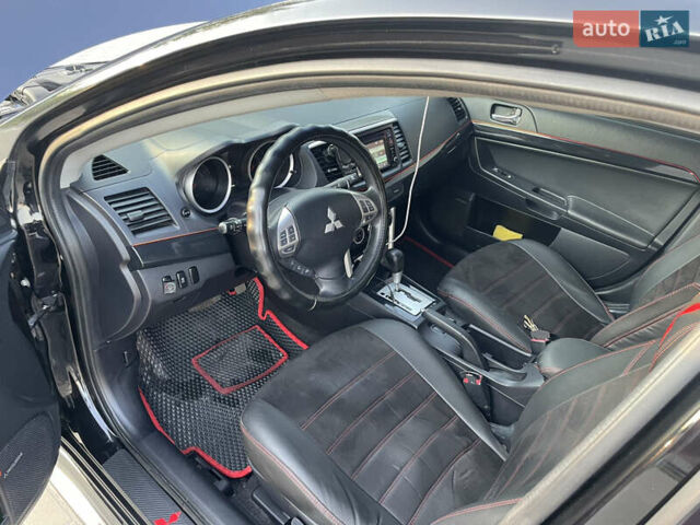 Черный Мицубиси Лансер, объемом двигателя 2.36 л и пробегом 136 тыс. км за 11600 $, фото 14 на Automoto.ua