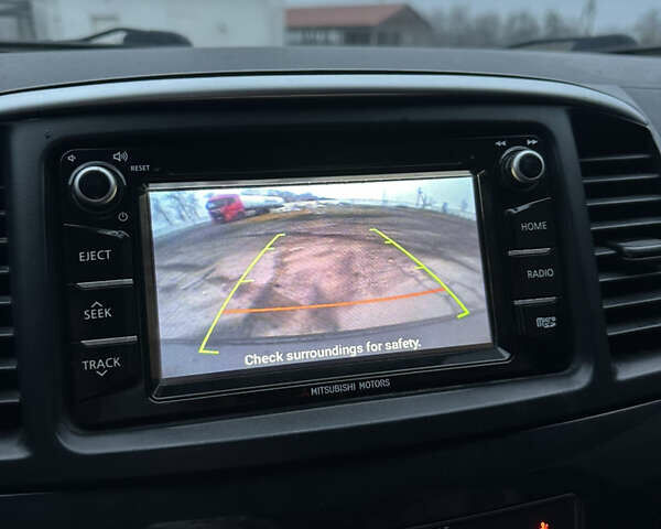 Черный Мицубиси Лансер, объемом двигателя 2 л и пробегом 142 тыс. км за 9500 $, фото 25 на Automoto.ua