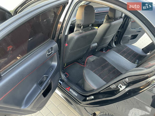 Черный Мицубиси Лансер, объемом двигателя 2.36 л и пробегом 136 тыс. км за 11600 $, фото 18 на Automoto.ua