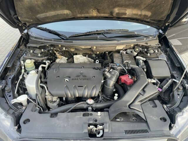 Черный Мицубиси Лансер, объемом двигателя 2.4 л и пробегом 140 тыс. км за 10800 $, фото 10 на Automoto.ua