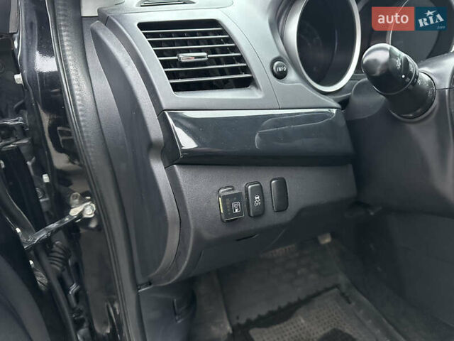 Черный Мицубиси Лансер, объемом двигателя 2 л и пробегом 142 тыс. км за 9500 $, фото 9 на Automoto.ua