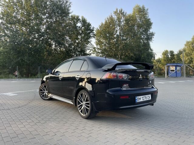 Черный Мицубиси Лансер, объемом двигателя 2.4 л и пробегом 140 тыс. км за 10800 $, фото 5 на Automoto.ua