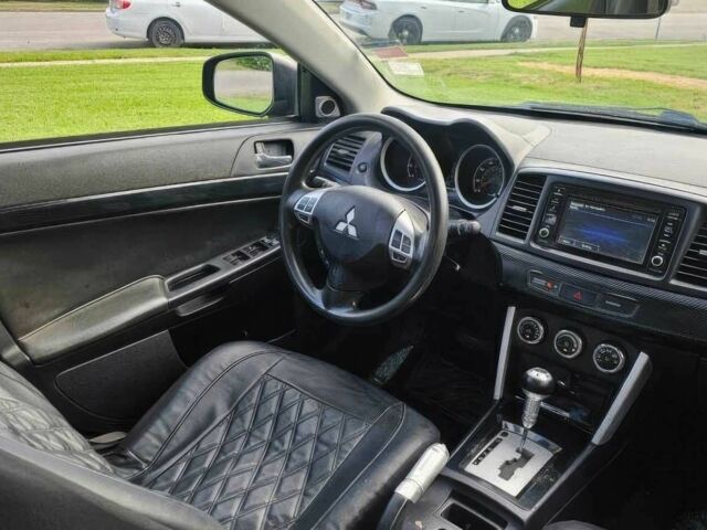 Чорний Міцубісі Lancer, об'ємом двигуна 2 л та пробігом 81 тис. км за 6000 $, фото 6 на Automoto.ua