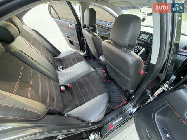 Черный Мицубиси Лансер, объемом двигателя 2.36 л и пробегом 136 тыс. км за 11600 $, фото 20 на Automoto.ua