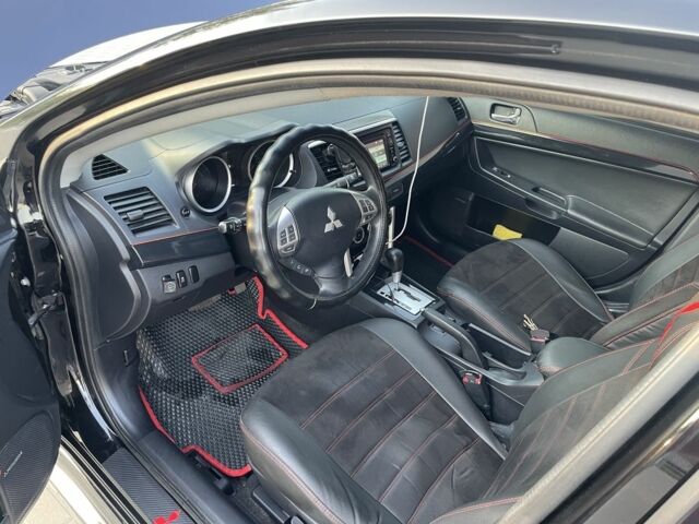 Черный Мицубиси Лансер, объемом двигателя 2.4 л и пробегом 140 тыс. км за 10800 $, фото 12 на Automoto.ua