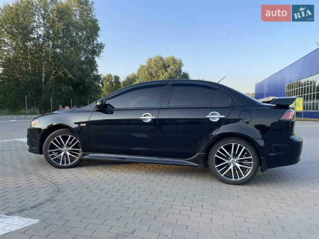 Черный Мицубиси Лансер, объемом двигателя 2.36 л и пробегом 136 тыс. км за 11600 $, фото 4 на Automoto.ua
